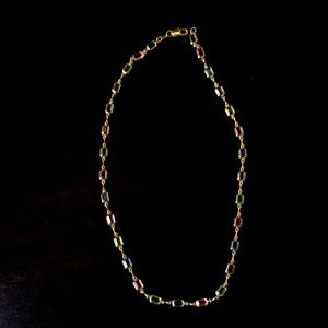 A dainty gemstone necklace set in 18k GF